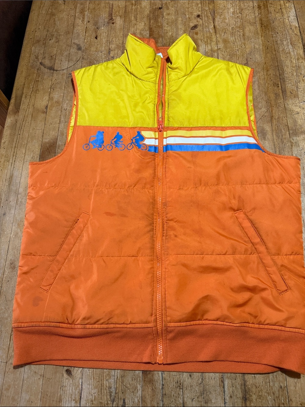 Stranger Things Orange & Yellow Puffer Vest - Bicycle Graphic